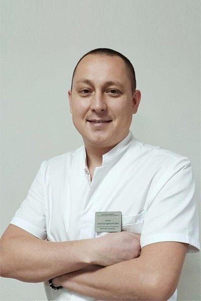 врач