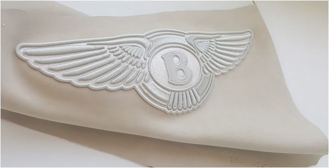 Тажима-Сервис: объемная 3D вышивка Bentley на коже