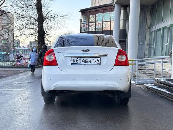 Помощь в продаже автомобиля Ford Focus 2009 вид сзади