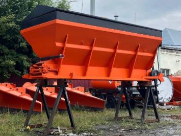 Пескоразбрасыватель в кузов самосвала