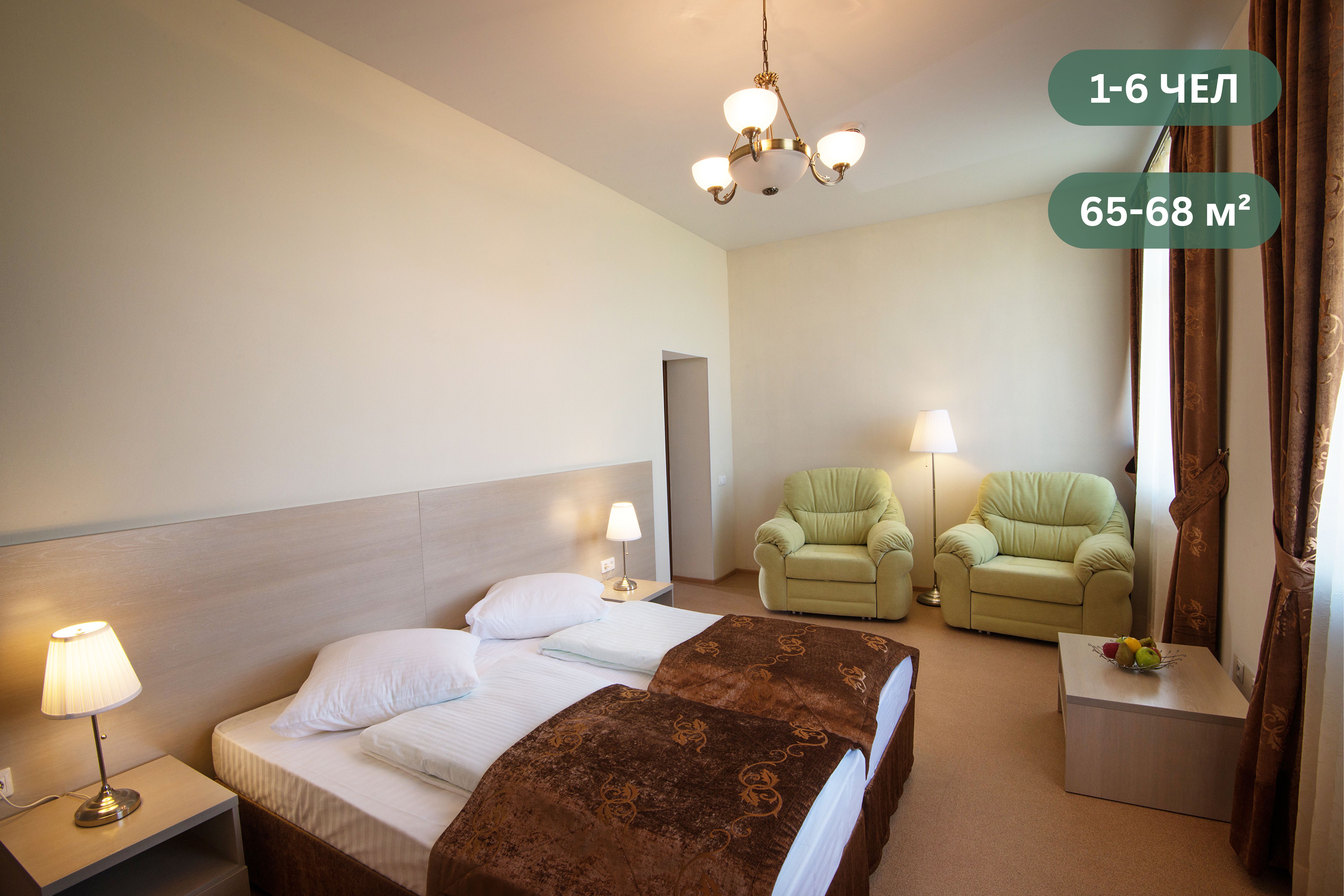 Номер категории люкс в гостинице Атом — спальня и гостиная