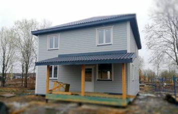 Двухэтажный каркасный дом с террасой