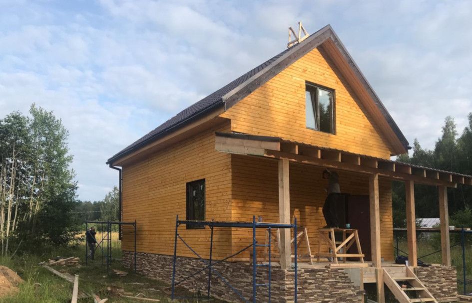 Каркасный дом с отделкой фасада вагонкой штиль