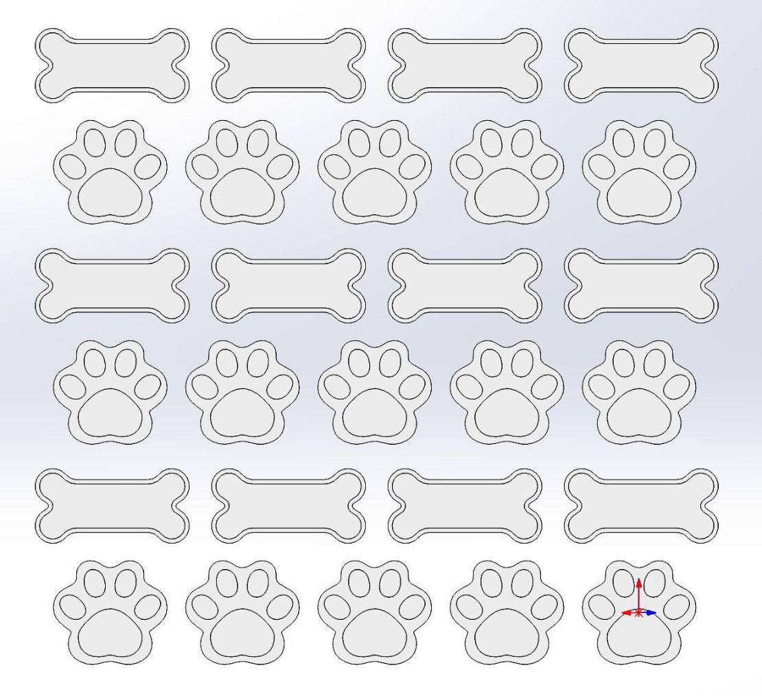 3D-модель силиконовой формы с ячейками в виде косточек и лап для литья лакомств