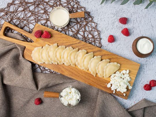 Вареники с творогом и малиной