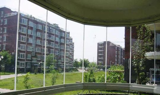 Панорамное безрамное остекление